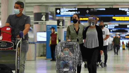 Nearly nine million Indian nationals live and work in West Asia, a majority of them in Saudi Arabia and the UAE. Hundreds of thousands of them returned to India during the pandemic. (AFP PHOTO). Nearly nine million Indian nationals live and work in West Asia, a majority of them in Saudi Arabia and the UAE. Hundreds of thousands of them returned to India during the pandemic. (AFP PHOTO).