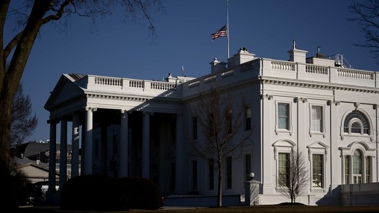 An American flag flies at half staff outside the White House in Washington, D.C., U.S., on Monday, Feb. 8, 2021. (Bloomberg) An American flag flies at half staff outside the White House in Washington, D.C., U.S., on Monday, Feb. 8, 2021. (Bloomberg)