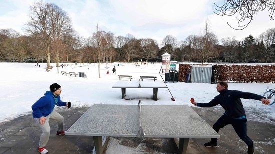 Two men playing table tennis in Hamburg's Stadpark on the morning of February 10. Northern and eastern Germany were particularly badly hit on February 7 and 8, with blizzard-like conditions and some of the coldest temperatures seen in years.(Morris Mac Matzen / AFP)