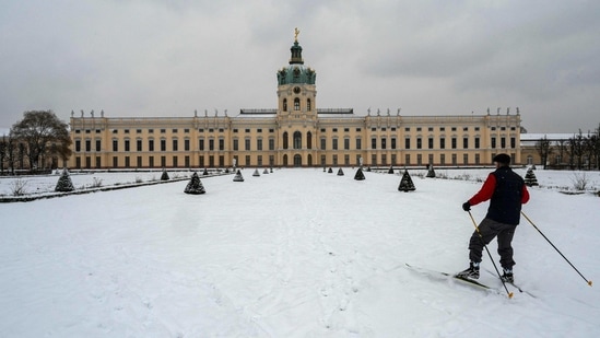 A man skis in the gardens of the Charlottenburg Palace in Berlin on February 9. Heavy snow has also fallen in other countries across central and northern Europe, including Belgium, the Netherlands and Denmark.(John Macdougall / AFP)