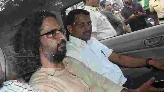 Rona Wilson, arrested for alleged Maoist links in Koregaon Bhima violence, being produced in court in Pune after his arrest in June 2018 (File Photo)(HT Photo)