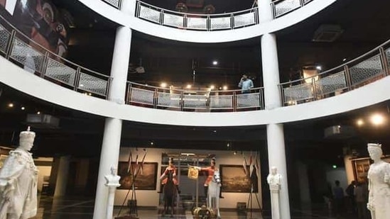 The three storeys of the Rashtrapati Bhavan Museum are seen along with statues of King George (left) and Queen Mary. The museum will be open to the public six days a week from October 2. The initial ticket price will be  <span class='webrupee'>₹</span>50. The President’s secretary, Omita Paul, said this would be the first sunken museum in the country, with two underground floors. (Raj K raj/HT Photo) 