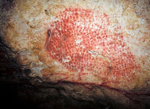 A prehistoric wall painting depicting a bison, in a French cave discovered in 1931. (AP) A prehistoric wall painting depicting a bison, in a French cave discovered in 1931. (AP)