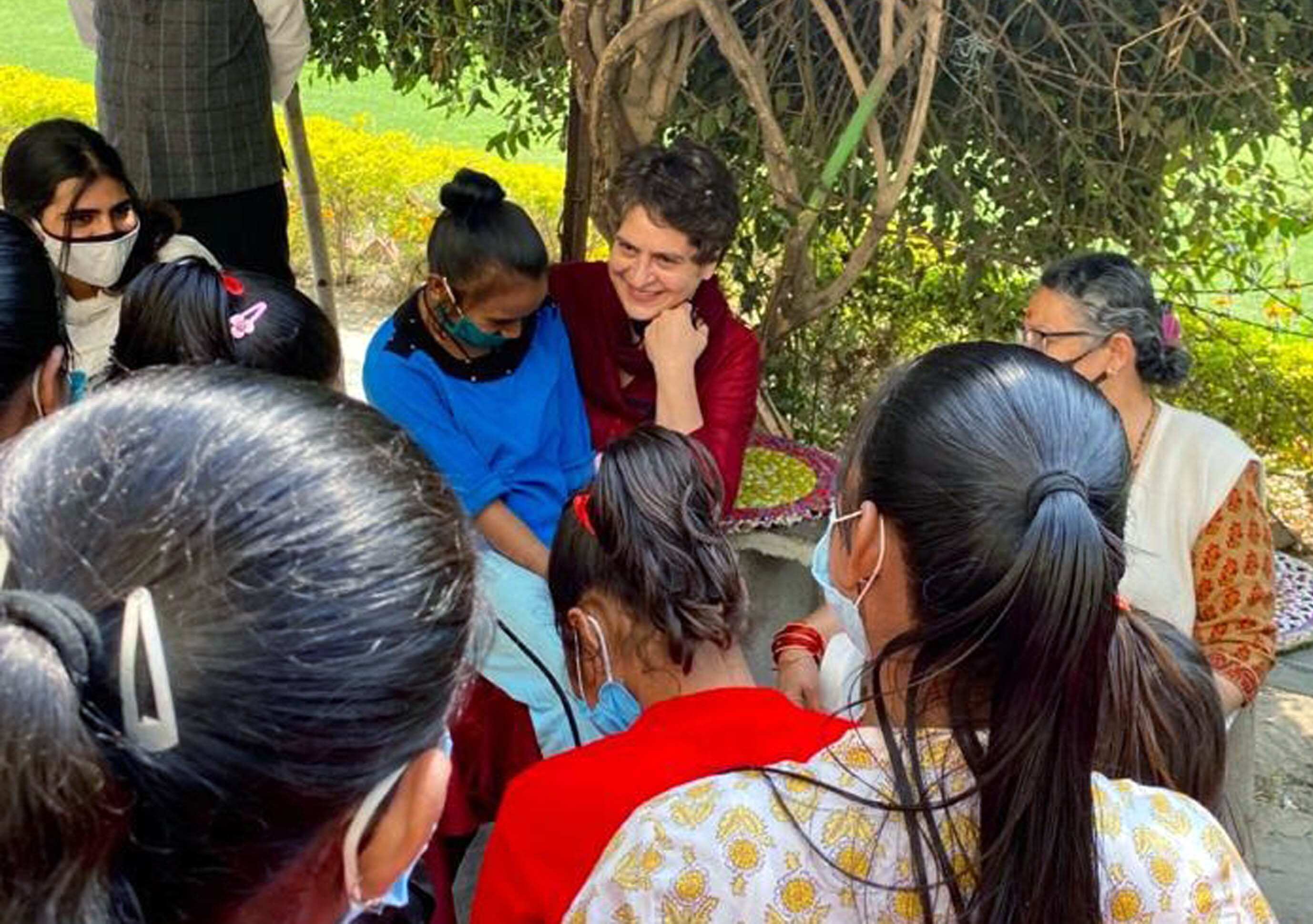 Congress General Secretary Priyanka Gandhi Vadra meets people during her visit at Anand Bhawan, in Prayagraj on Thursday. (ANI Photo)