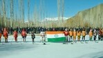 Players hold the Tricolor during the ice hockey tournament under Khelo India Winter Games, Chiktan in Kargil district, Sunday, Jan. 10, 2021. (Representative image) (PTI)
