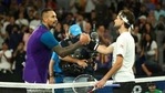 Australia's Nick Kyrgios, left, congratulates Austria's Dominic Thiem for winning their third round match at the Australian Open tennis championship in Melbourne, Australia, Friday, Feb. 12, 2021. (AP) Australia's Nick Kyrgios, left, congratulates Austria's Dominic Thiem for winning their third round match at the Australian Open tennis championship in Melbourne, Australia, Friday, Feb. 12, 2021. (AP)
