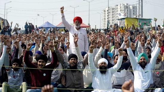 Farmers shouting slogans at the demonstration site during the ongoing farmer protest against the new farm laws at Ghazipur Border, in New Delhi. Farmers shouting slogans at the demonstration site during the ongoing farmer protest against the new farm laws at Ghazipur Border, in New Delhi.