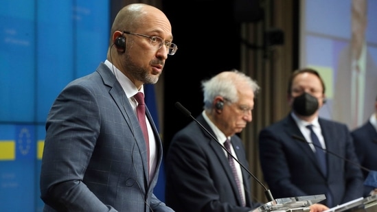 Ukraine's Prime Minister Denys Shmyhal, left, speaks next to European Union foreign policy chief Josep Borrell, center, and European Commissioner at a joint news conference following an EU-Ukraine Association Council at the European Council headquarters in Brussels, Thursday, Feb. 11, 2021. (AP) Ukraine's Prime Minister Denys Shmyhal, left, speaks next to European Union foreign policy chief Josep Borrell, center, and European Commissioner at a joint news conference following an EU-Ukraine Association Council at the European Council headquarters in Brussels, Thursday, Feb. 11, 2021. (AP)