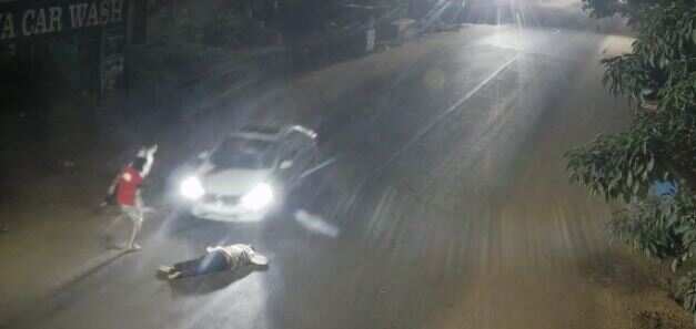 Videograb from the incident where a car is seen running over the YSR corporator.