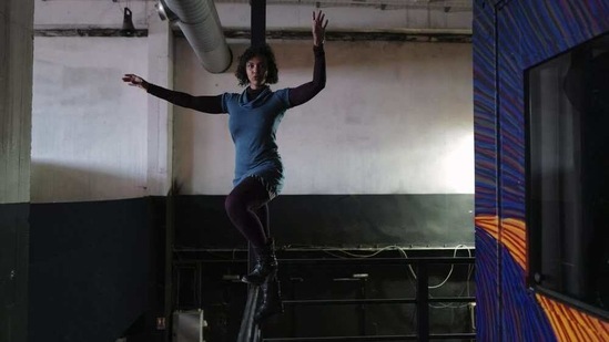 French tightrope walker Tatiana-Mosio Bongoga, presents her documentary on her performance on a 400-meter tightrope walk that was suspended at a height of 40 meters without any protection across the Vltava river in Prague in 2019, during the BIAC, International Circus Art Biennale in Marseille, south of France, Wednesday, Feb. 3, 2021.(AP)