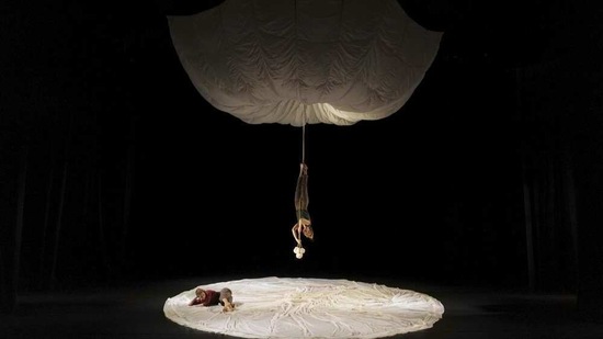 Performers Pauline Barboux and Jeanne Ragu of the Libertivore company present their show "Ether" directed by Fanny Soriano during the BIAC, International Circus Arts Biennale, in Marseille, south of France, Wednesday, Feb. 3, 2021. (AP)