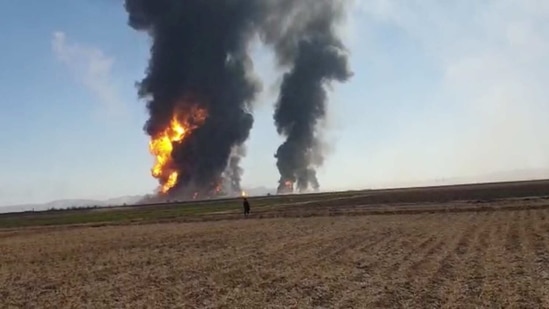 Fire spread to the Dogharoon customs facilities on the Iran side.(Reuters)