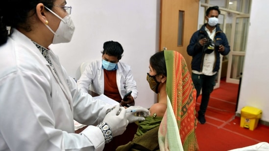 Municipal Corporation of Delhi (MCD) worker takes a jab of Covid-19 vaccine, in New Delhi. (ANI Photo) Municipal Corporation of Delhi (MCD) worker takes a jab of Covid-19 vaccine, in New Delhi. (ANI Photo)