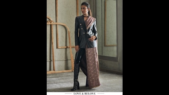 A model rocks a pair of PVC pants and blazers teamed with a sari (Photo: Instagram/TarunTahiliani) A model rocks a pair of PVC pants and blazers teamed with a sari (Photo: Instagram/TarunTahiliani)