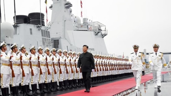 A file photo of Chinese President Xi Jinping reviewing the honour guards of the Chinese People’s Liberation Navy in 2019. (Reuters file) A file photo of Chinese President Xi Jinping reviewing the honour guards of the Chinese People’s Liberation Navy in 2019. (Reuters file)