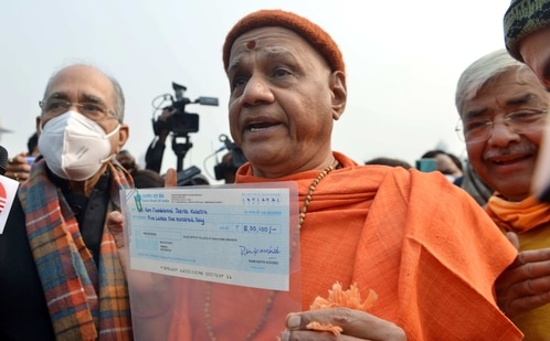 Treasurer of Ram Janmabhoomi Swami Govind Dev Giri Maharaj with committee head for Ram Mandir construction Nripendra Misra and VHP president Alok Kumar in this file picture from January 2021. (ANI Photo)