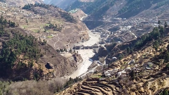 **EDS: BEST QUALITY AVAILABLE, HANDOUT IMAGE MADE AVAILABLE FROM ITBP** Chamoli: Damaged dam of the Rishi Ganga Power Project, after a glacier broke off in Joshimath in Uttarakhand�s Chamoli district causing a massive flood in the Dhauli Ganga river, Sunday, Feb. 7, 2021. More than 150 labourers working at the Rishi Ganga power project may have been directly affected. (PTI Photo)(PTI02_07_2021_000055B)(PTI)