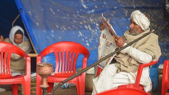 Farmers during their ongoing agitation against new farm laws, at Ghazipur border. (PTI) Farmers during their ongoing agitation against new farm laws, at Ghazipur border. (PTI)