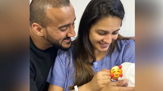 Anita Hassanandani and Rohit Reddy with their son.