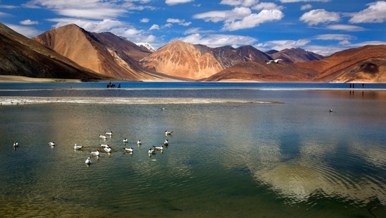 After a nine-month standoff, the two militaries reached the agreement on disengagement in the north and south banks of Pangong lake. (AP Photo) After a nine-month standoff, the two militaries reached the agreement on disengagement in the north and south banks of Pangong lake. (AP Photo)