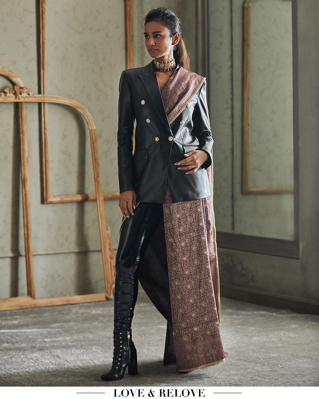 A model rocks a pair of PVC pants and blazers teamed with a sari (Photo: Instagram/TarunTahiliani) A model rocks a pair of PVC pants and blazers teamed with a sari (Photo: Instagram/TarunTahiliani)