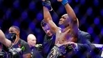 FILE - In this March 2, 2019, file photo, Kamaru Usman celebrates after his win against Tyron Woodley in a welterweight mixed martial arts title fight at UFC 235 in Las Vegas. Usman and Gilbert Burns were teammates only a year ago, and their children were fast friends. After Usman's split from their gym and Burns' impressive rise in the welterweight division, they'll meet for Usman's title belt at UFC 258 this weekend. (AP Photo/John Locher, File)(AP) FILE - In this March 2, 2019, file photo, Kamaru Usman celebrates after his win against Tyron Woodley in a welterweight mixed martial arts title fight at UFC 235 in Las Vegas. Usman and Gilbert Burns were teammates only a year ago, and their children were fast friends. After Usman's split from their gym and Burns' impressive rise in the welterweight division, they'll meet for Usman's title belt at UFC 258 this weekend. (AP Photo/John Locher, File)(AP)