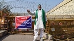 Farmer leader Rakesh Tikait speaks to the media during an ongoing protest against new farm laws, at the Delhi-Ghazipur border in New Delhi on Wednesday. (ANI Photo) Farmer leader Rakesh Tikait speaks to the media during an ongoing protest against new farm laws, at the Delhi-Ghazipur border in New Delhi on Wednesday. (ANI Photo)