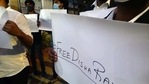 Students and supporters of activist Disha Ravi hold placards during a protest in support of activist Disha Ravi and asked how she allowed arresting by Delhi police, in Bengaluru on Sunday. (ANI Photo) Students and supporters of activist Disha Ravi hold placards during a protest in support of activist Disha Ravi and asked how she allowed arresting by Delhi police, in Bengaluru on Sunday. (ANI Photo)