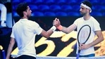 Buglaria's Grigor Dimitrov, right, shakes hands with Austria's Dominic Thiem after Dimitrov won their fourth round match at the Australian Open tennis championships in Melbourne, Australia, Sunday, Feb. 14, 2021. (AP) Buglaria's Grigor Dimitrov, right, shakes hands with Austria's Dominic Thiem after Dimitrov won their fourth round match at the Australian Open tennis championships in Melbourne, Australia, Sunday, Feb. 14, 2021. (AP)