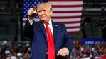 Donald Trump gestures to the crowd as he arrives to speak at a campaign rally (AP File Photo ) Donald Trump gestures to the crowd as he arrives to speak at a campaign rally (AP File Photo )