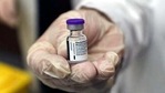 A medical staffer holds a vial of the Pfizer-BioNTech Covid-19 vaccine.(AP) A medical staffer holds a vial of the Pfizer-BioNTech Covid-19 vaccine.(AP)