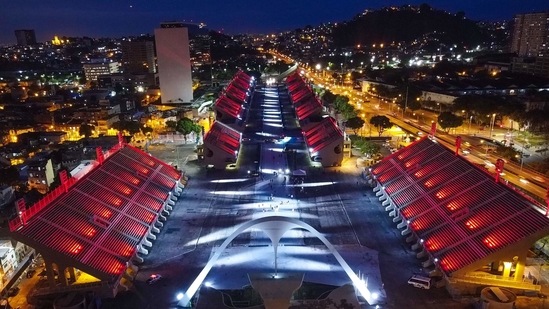 A set of colored lights illuminates the Marques de Sapucai avenue, known as Passarela do Samba, in Rio de Janeiro on February 12. The light show was a homage to the samba schools of Rio de Janeiro that will not perform the carnival parade due to the Coronavirus pandemic.(Andre Coelho / AFP))