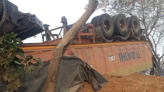 Such was the impact that the truck overturned after the accident. (HT Photo) Such was the impact that the truck overturned after the accident. (HT Photo)