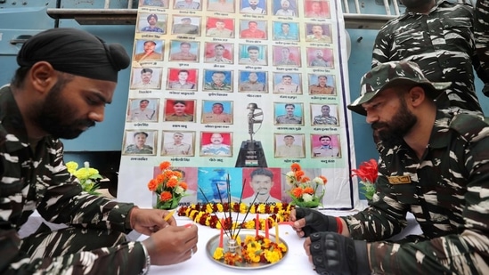 Jammu: Central Reserve Police Force (CRPF) personnel pay tribute to the martyrs, on the eve of the second anniversary of Pulwama attack, in Jammu, Saturday, Feb. 13, 2021. (PTI Photo)(PTI02_13_2021_000260B)(PTI)