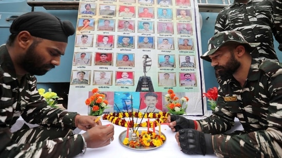 Central Reserve Police Force (CRPF) personnel pay tribute to the martyrs, on the eve of the second anniversary of Pulwama attack, in Jammu, Saturday, Feb. 13, 2021. (PTI Photo)(PTI) Central Reserve Police Force (CRPF) personnel pay tribute to the martyrs, on the eve of the second anniversary of Pulwama attack, in Jammu, Saturday, Feb. 13, 2021. (PTI Photo)(PTI)