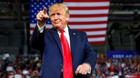 Donald Trump gestures to the crowd as he arrives to speak at a campaign rally (AP File Photo )