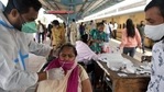 A health worker collects a swab sample from a passenger at the Dadar Terminal in Mumbai on February 12. Maharashtra on February 14 recorded over 4,000 Covid-19 cases after a gap of 39 days. A health worker collects a swab sample from a passenger at the Dadar Terminal in Mumbai on February 12. Maharashtra on February 14 recorded over 4,000 Covid-19 cases after a gap of 39 days.