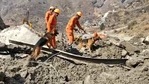 A team of NDRF searches with the help of dogs at Raini Village in Chamoli. (ANI Photo) A team of NDRF searches with the help of dogs at Raini Village in Chamoli. (ANI Photo)