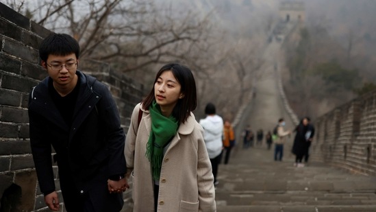 People visit the Mutianyu section of the Great Wall of China during a day with polluted air, following the outbreak of the coronavirus disease (COVID-19), in Beijing, China February 13, 2021. REUTERS/Carlos Garcia Rawlins(REUTERS)