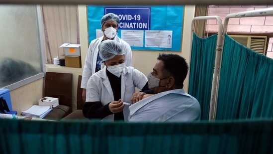 The low turnout for the second shot of vaccine was attributed to communication issues, as many beneficiaries claimed they did not receive any intimation through SMS on their mobile phones. (HT PHOTO) (Image used for representation). (Bloomberg) The low turnout for the second shot of vaccine was attributed to communication issues, as many beneficiaries claimed they did not receive any intimation through SMS on their mobile phones. (HT PHOTO) (Image used for representation). (Bloomberg)