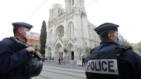 FILE - In this Oct. 29, 2020, file photo, police officers stand guard near Notre Dame church in Nice, southern France. Scrubbing France clean of radicals and their breeding grounds is a priority cause of President Emmanuel Macron in a nation bloodied by terror attacks, including the beheading of a teacher outside his school in a Paris suburb followed by a deadly attack inside the basilica. (Eric Gaillard/Pool Photo via AP, File) (AP) FILE - In this Oct. 29, 2020, file photo, police officers stand guard near Notre Dame church in Nice, southern France. Scrubbing France clean of radicals and their breeding grounds is a priority cause of President Emmanuel Macron in a nation bloodied by terror attacks, including the beheading of a teacher outside his school in a Paris suburb followed by a deadly attack inside the basilica. (Eric Gaillard/Pool Photo via AP, File) (AP)