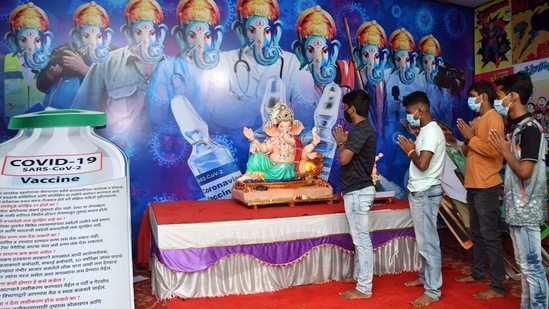 Devotees offer prayer to Hindu deity Ganesh on the occasion of Maghi Ganpati Janmotsav, at Pratiksha Nagar in Mumbai on February 15. Dr Shashank Joshi, member of the Covid task force in Maharashtra told HT that the increase in cases has coincided with three things—full unlocking, gram panchayat elections, and some degree of schools and colleges reopening.(ANI)