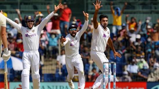India's spinner Ravichandran Ashwin celebrates with teammates the wicket of England's Dom Sibley during the 2nd day of second cricket test match between India and England, at M.A. Chidambaram Stadium.(PTI)