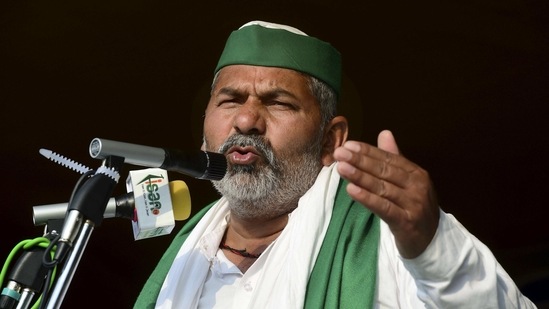 Bharatiya Kisan Union (BKU) spokesperson Rakesh Tikait addresses farmers during the ongoing farmers' agitation against the three farm laws at Ghazipur border, in New Delhi. (PTI) Bharatiya Kisan Union (BKU) spokesperson Rakesh Tikait addresses farmers during the ongoing farmers' agitation against the three farm laws at Ghazipur border, in New Delhi. (PTI)