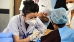 A health worker receives a Covid-19 vaccine shot, at AIIMS in New Delhi on Saturday. (ANI Photo) A health worker receives a Covid-19 vaccine shot, at AIIMS in New Delhi on Saturday. (ANI Photo)