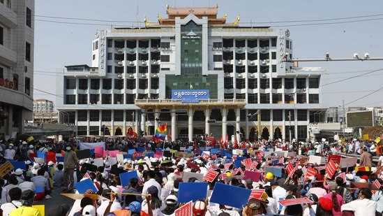 Demonstrators protest outside Mandalay railway station on February 15. No reason has been announced for why the government ordered internet access to be blocked on February 14 and 15 nights, AP reported.(AP)
