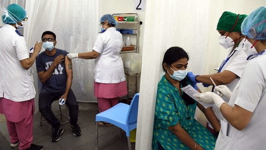 Frontline workers being administered Covid-19 vaccines in Mumbai on Monday.(ANI Photo)