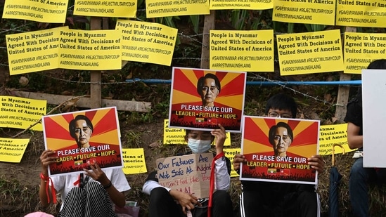 Demonstrators hold posters of detained Myanmar leader Aung Saan Suu Kyi during the ongoing protest against the military coup, outside the United States embassy in Yangon on February 16. Groups of demonstrators turned out early in Yangon and other cities demanding Suu Kyi and members of her ousted government be freed from detention.(Sai Aung Main / AFP)