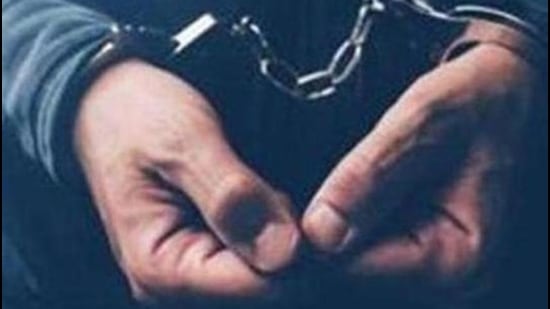 Arrested computer hacker and cyber criminal with handcuffs, close up of hands (Getty Images/iStockphoto) Arrested computer hacker and cyber criminal with handcuffs, close up of hands (Getty Images/iStockphoto)