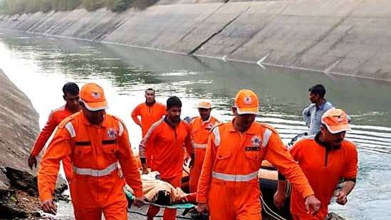 NDRF team carries out a rescue operation after an overcrowded bus plunged into a canal in Sidhi district of Madhya Pradesh. (PTI) NDRF team carries out a rescue operation after an overcrowded bus plunged into a canal in Sidhi district of Madhya Pradesh. (PTI)